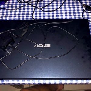 A ASUS laptop:fold down screen: 2RAM: 64g storage